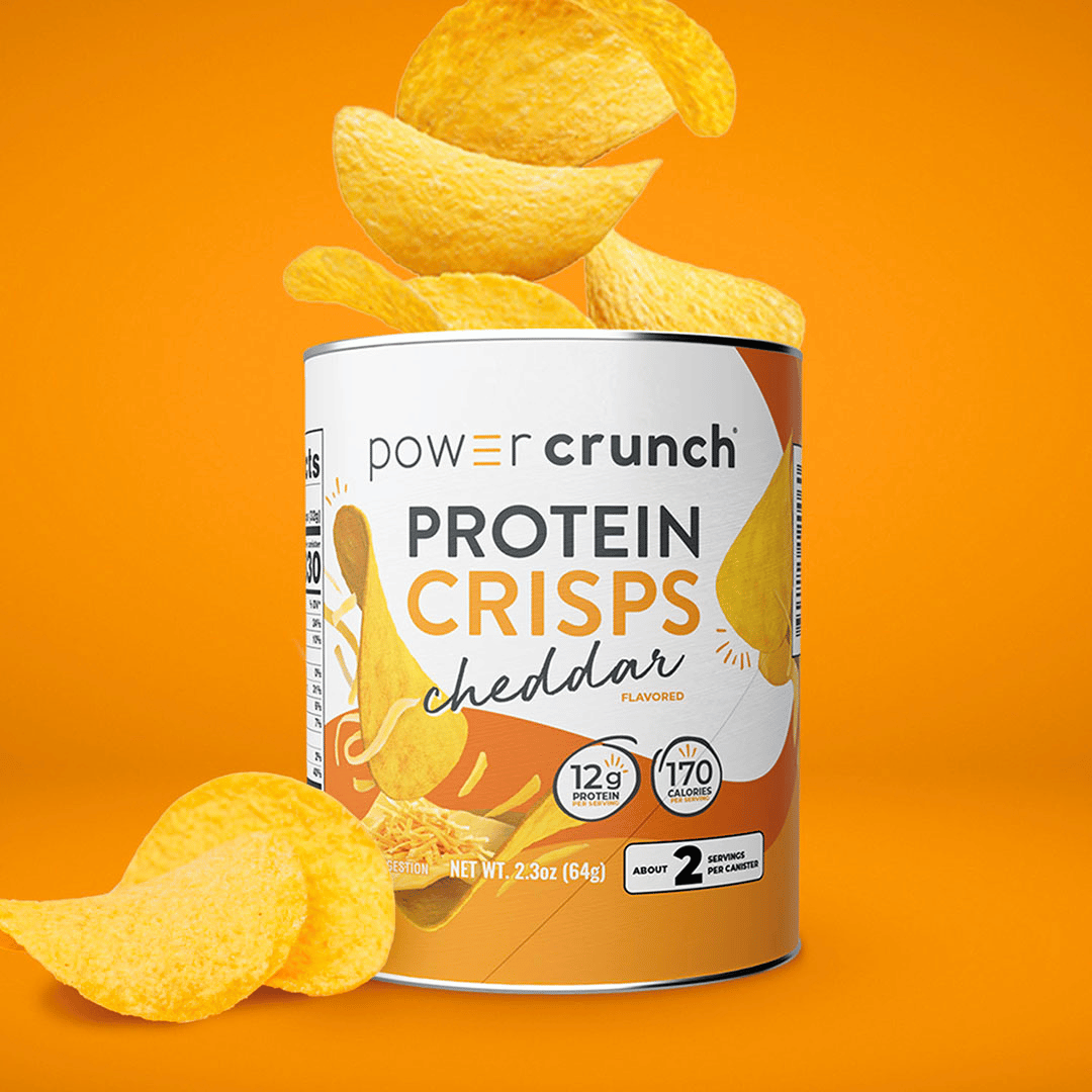 Can of Power Crunch Protein Crisps Cheddar on an orange background