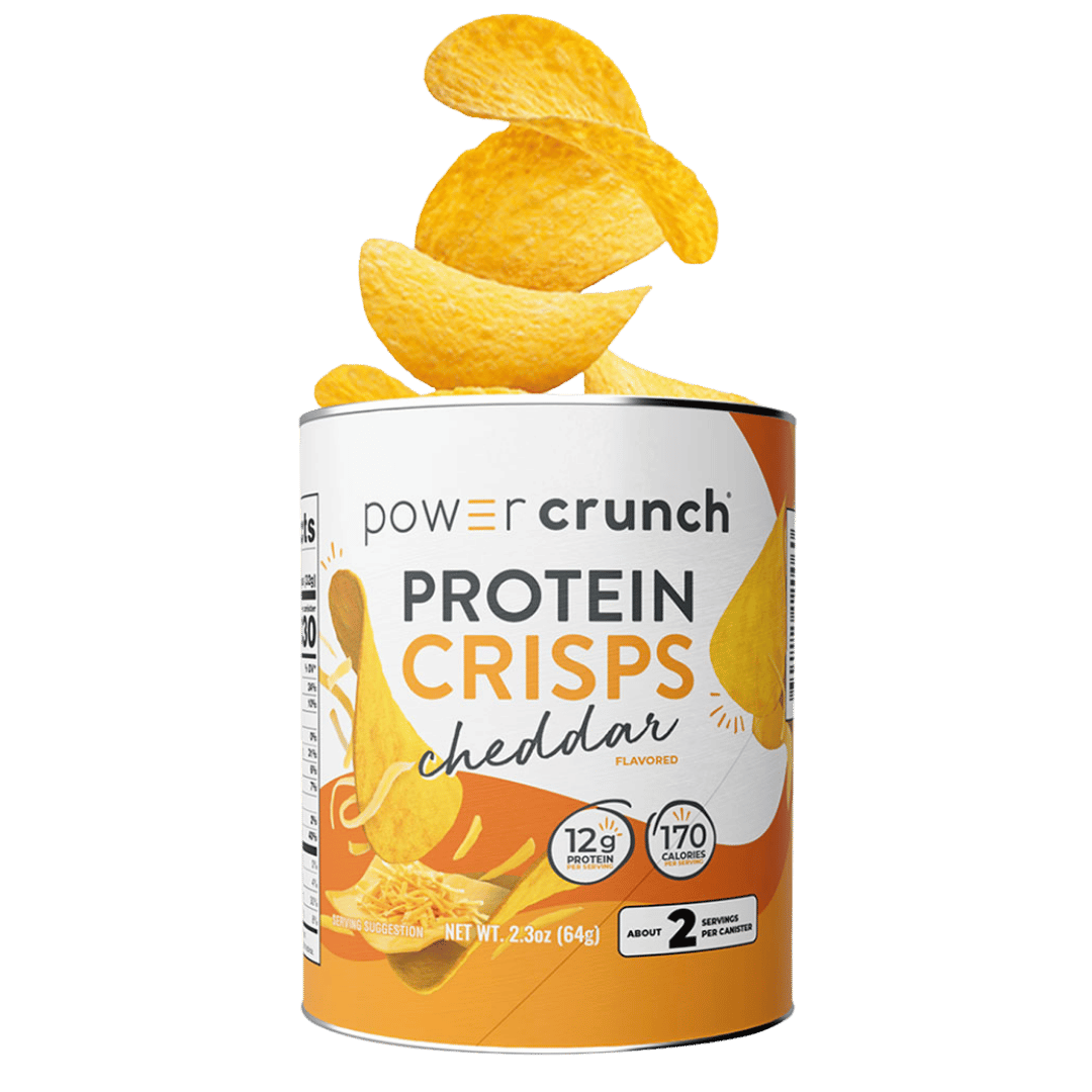 Can of Power Crunch Protein Crisps Cheddar flavor with crisps spilling out on a green background