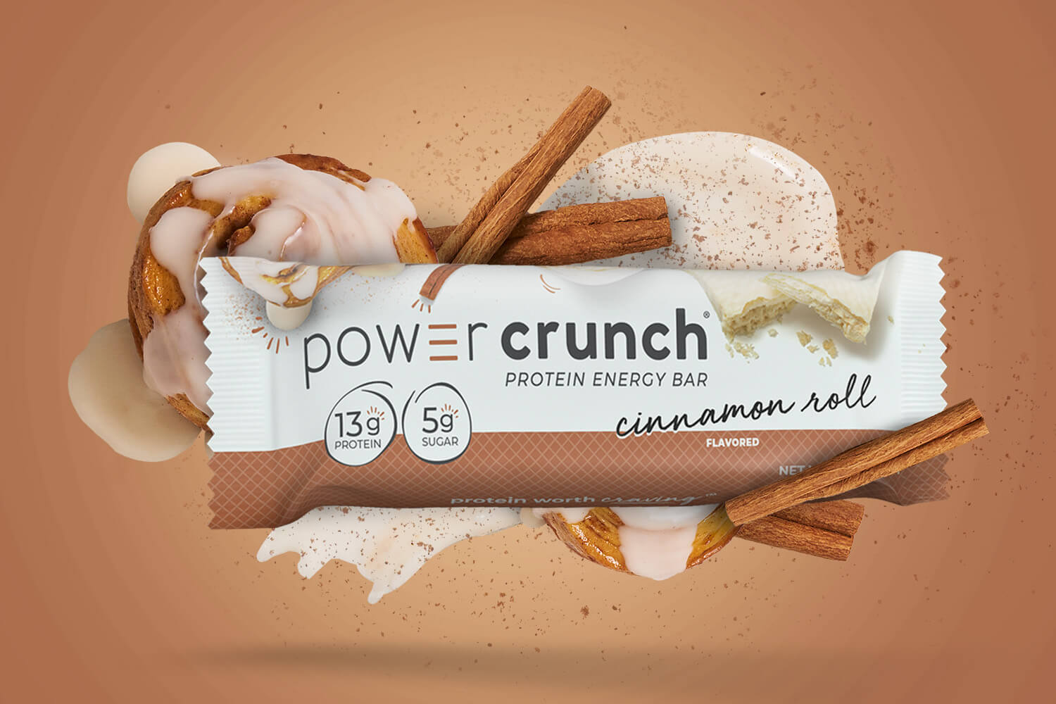 cinnamon roll protein bars pictured with cinnamon flavor explosion